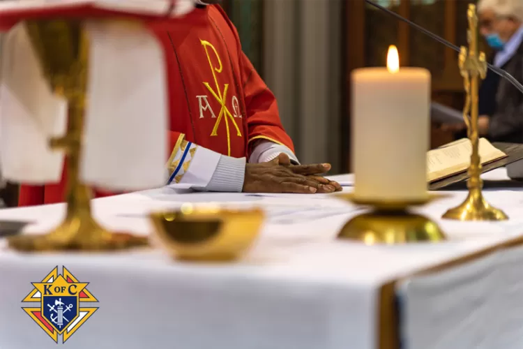 Priest at the altar during Holy Mass