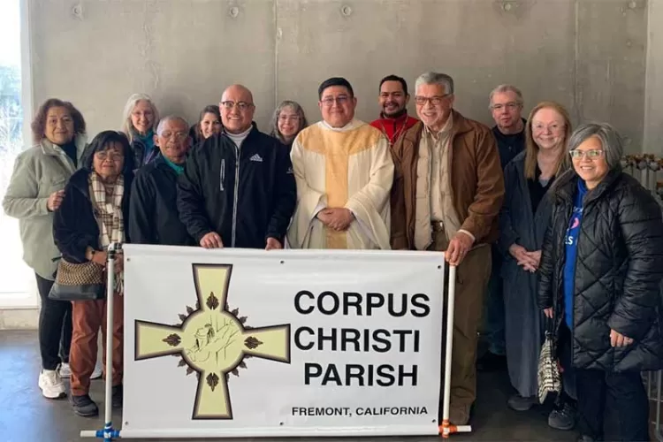 Father Luis Lopez with Parishioners from Corpus Christi Parish